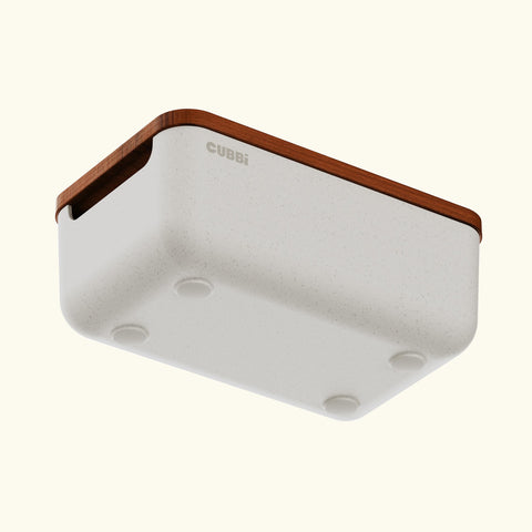 Cubbi promotes clean, organized storage with a cutout to brush leftovers back.