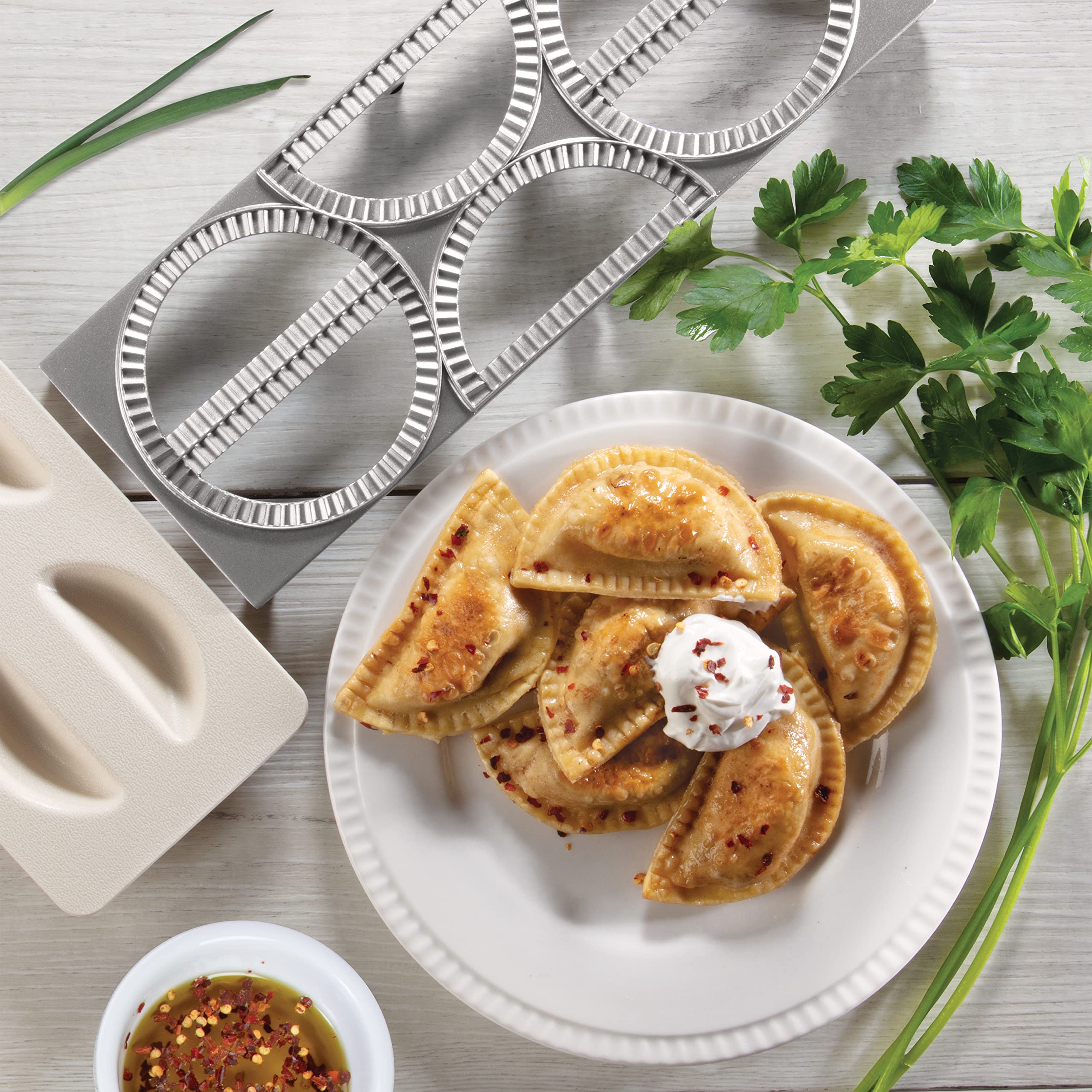 CucinaPro Pierogi Maker tray included for easy setup and serving.