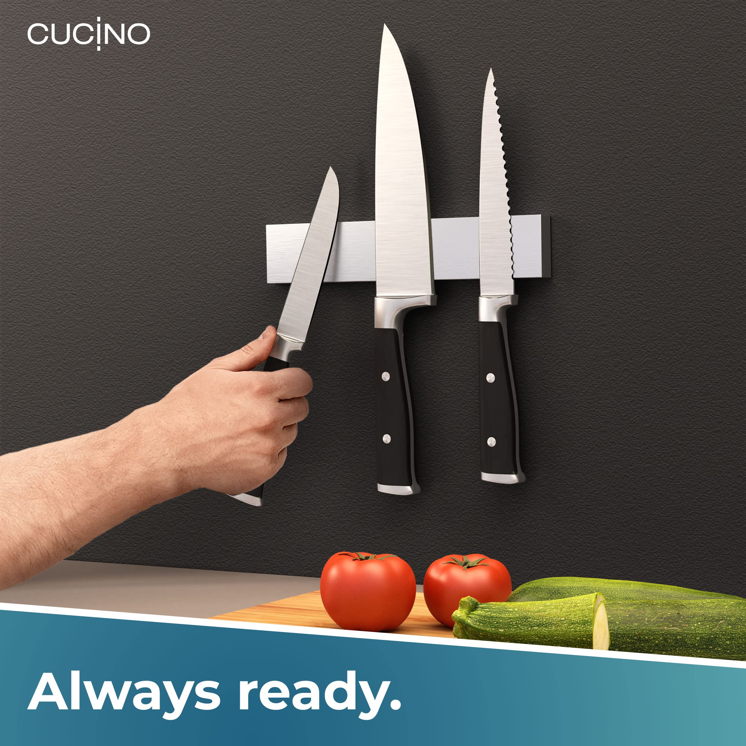 Award-winning Cucino knife magnet in action organizing metal utensils within reach.