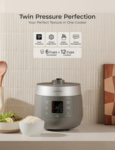 CUCKOO Twin Pressure Rice Cooker with uncooked rice ready for diverse grains