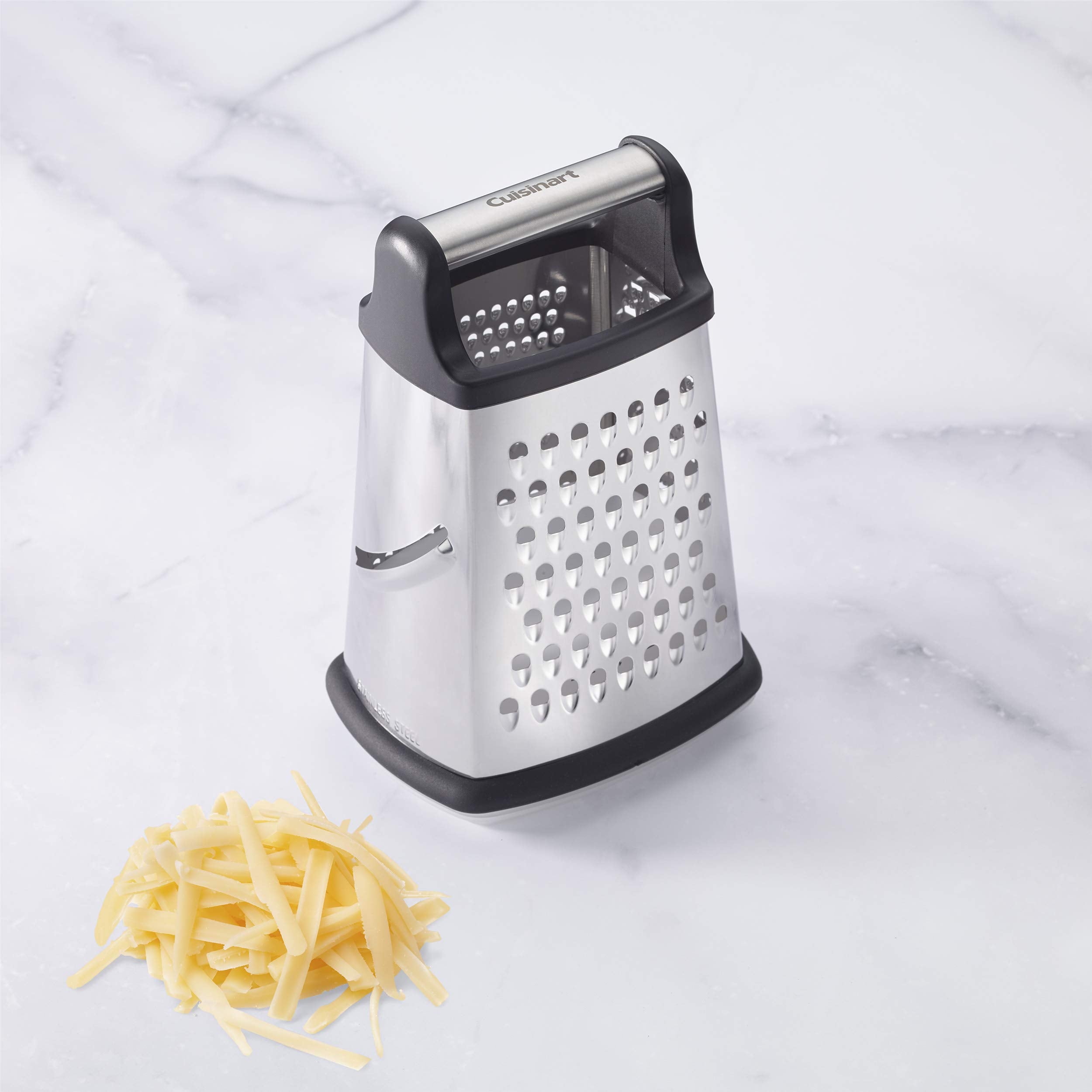 Cuisinart box grater with four surfaces shows versatility for shredding and slicing.