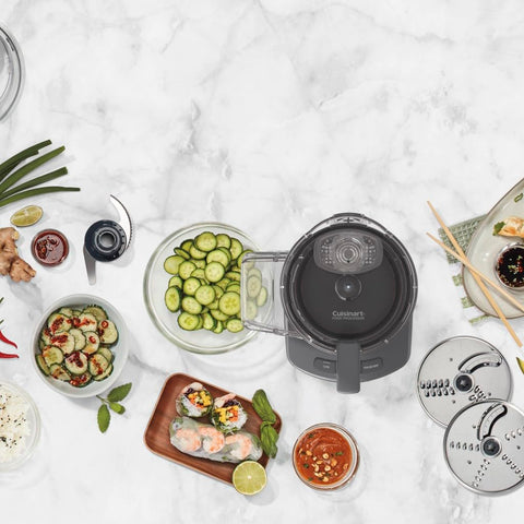 Cuisinart in-bowl storage keeps discs and universal blade organized between uses.