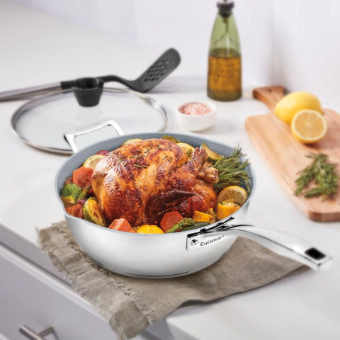 Cuisinart lid knob includes built-in utensil holder for easy access.