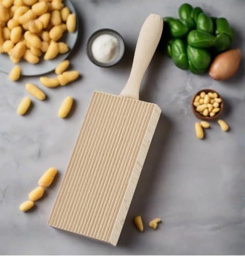 Cuisinox beachwood pasta board with handle for easy shaping.