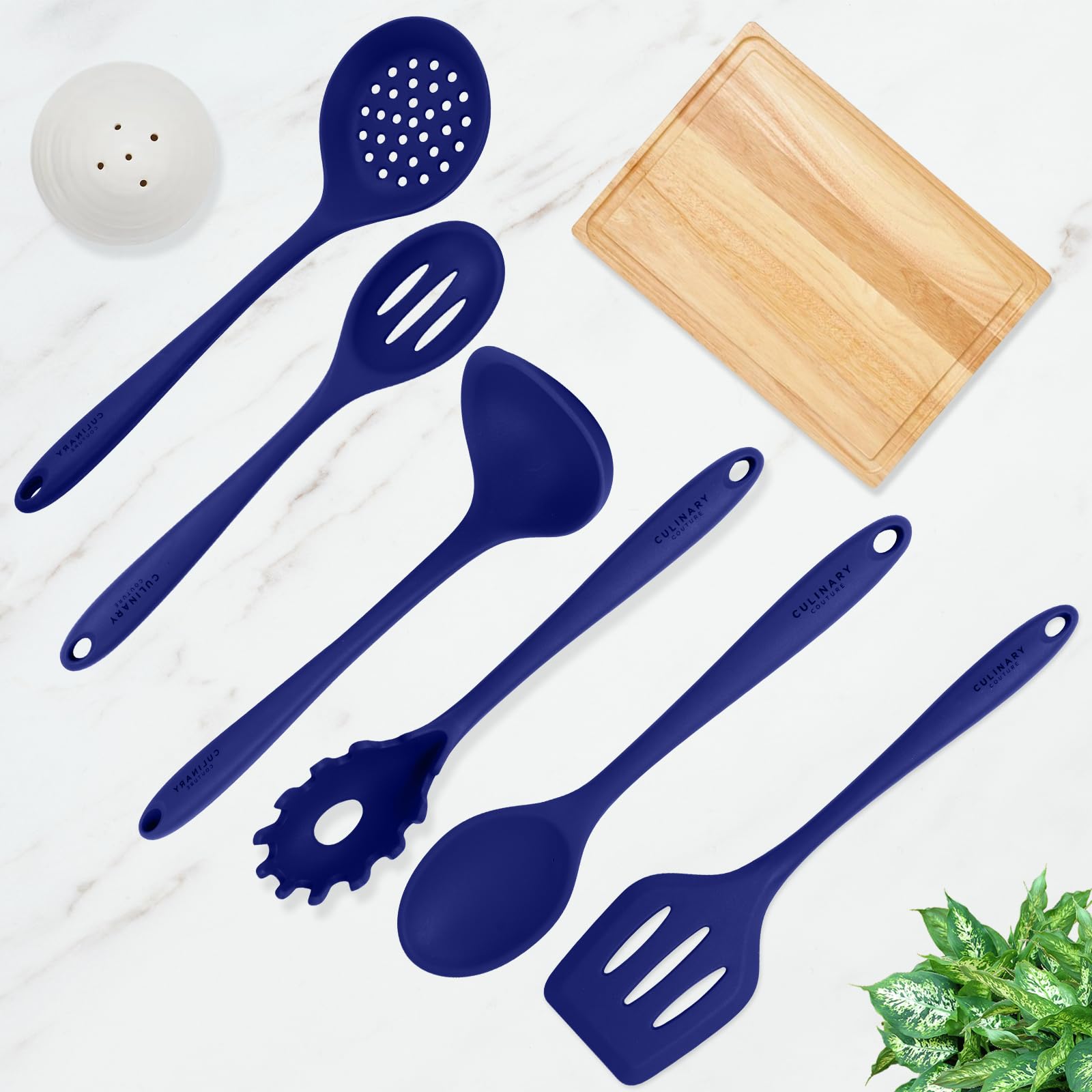 Culinary Couture blue utensils in a drawer for easy organization.