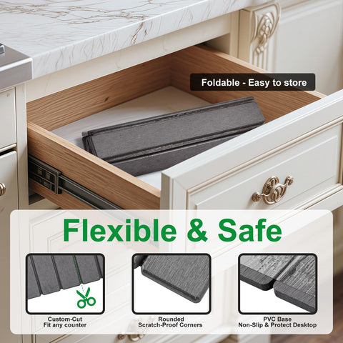 Dark gray finish of Cuomaop mat resists marks for cleaner countertops.