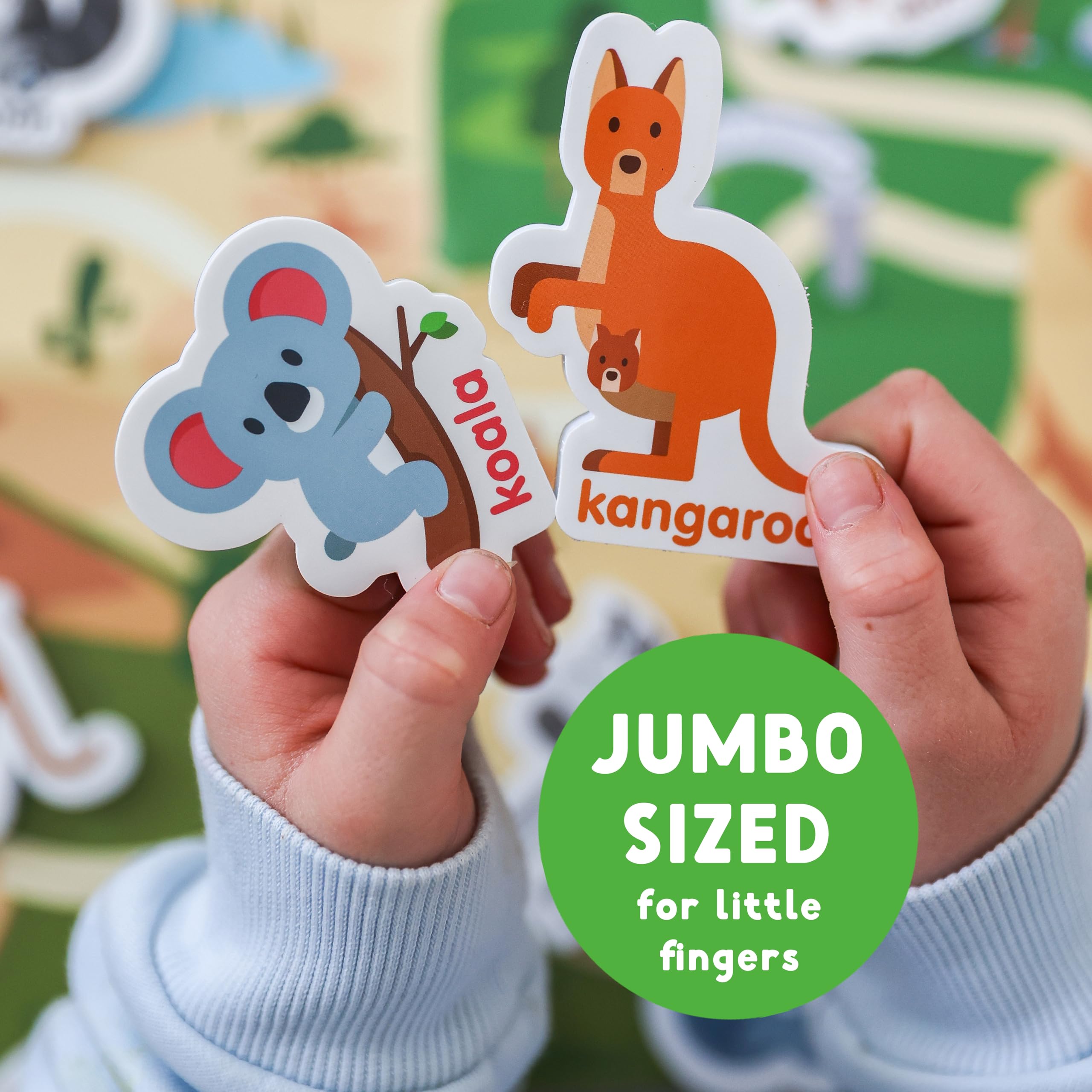 Curious Columbus zebra magnet sparks phonics and animal habit discussion during fridge play.