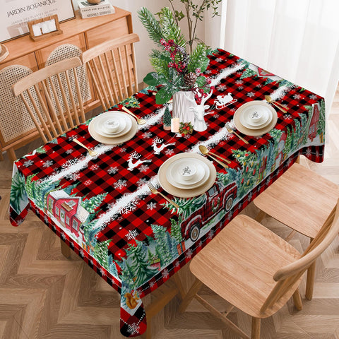 Table set for eight to ten with Cusugbaso red plaid tablecloth