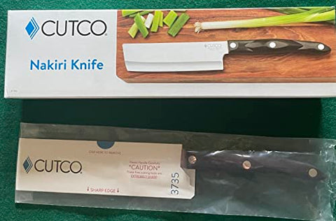 Cutco Nakiri knife close-up on razor-sharp edge for effortless chopping.