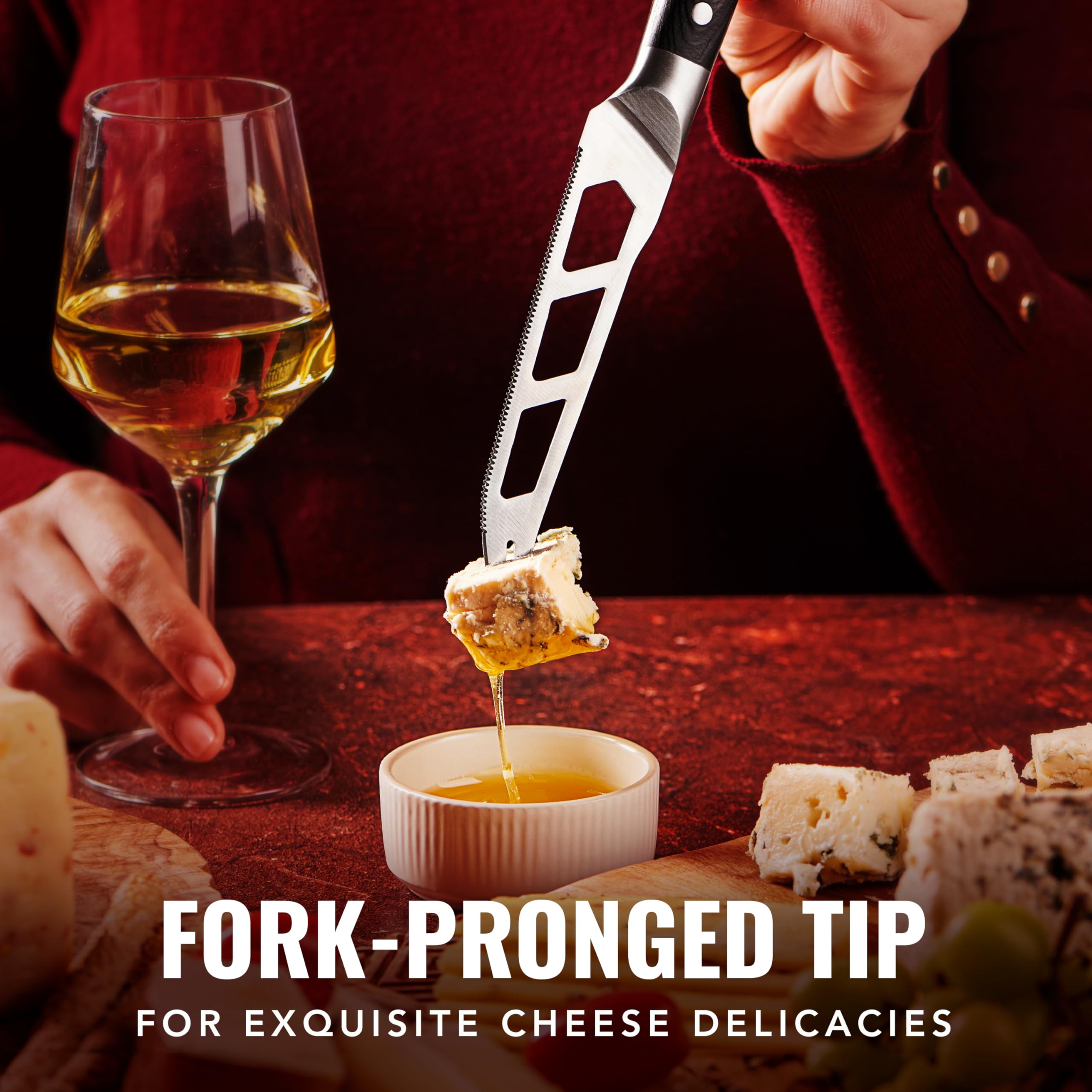 Cutluxe cheese knife serrated edge provides precise cheese slices.