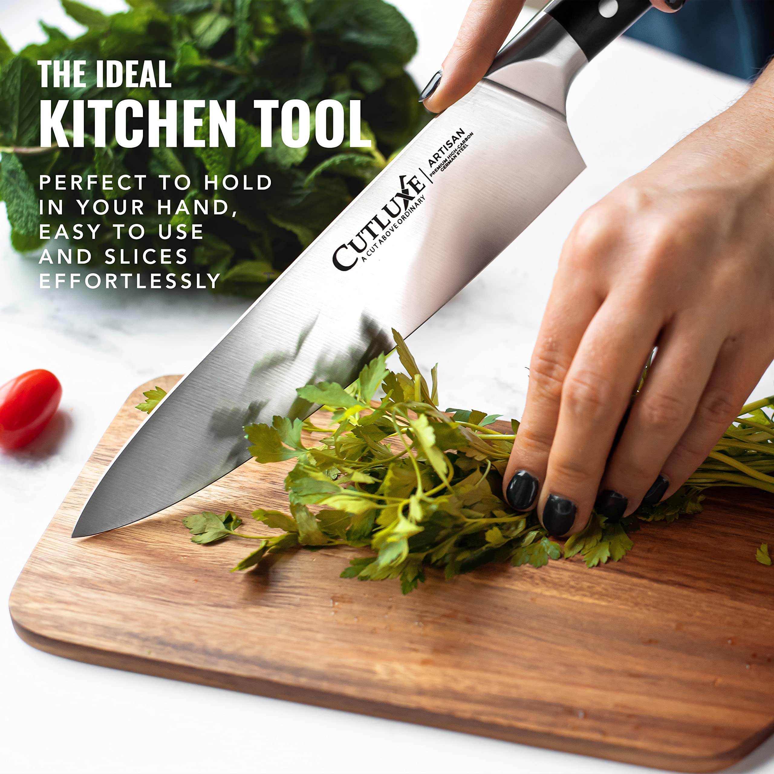 Cutluxe chef knife chopping vegetables showcasing versatility.