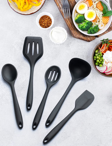 Daily Kisn solid spatula used to scrape batter without scratching pans.
