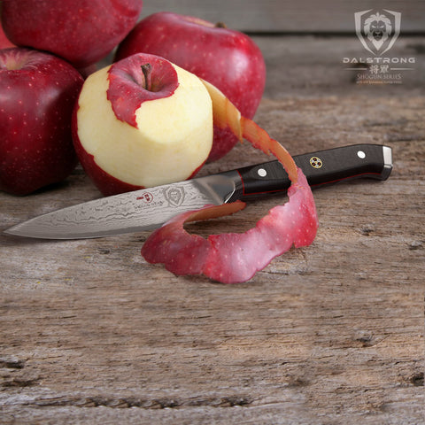 Dalstrong paring knife in action, prepping fruits and vegetables with ease