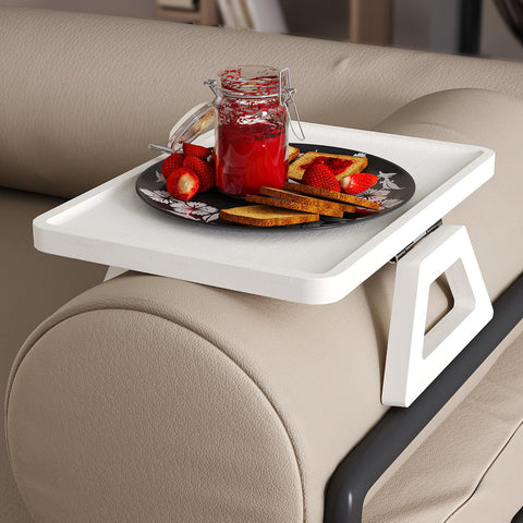 Danfoxer tray keeps remotes, cups, and phones within reach.
