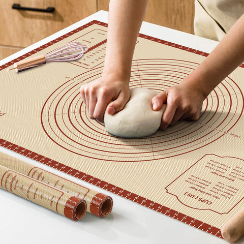 Dania & Dean silicone baking mat 36x24 laid flat with nonstick surface for cookies.