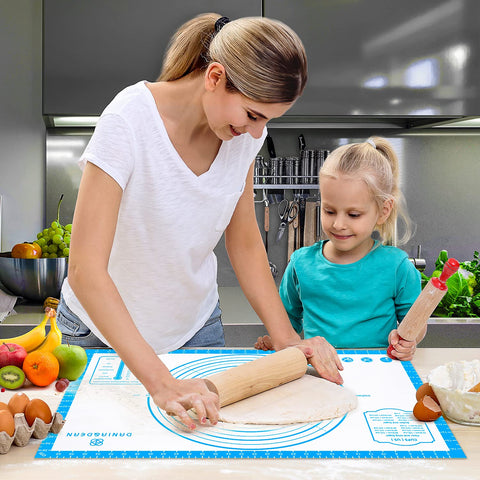 DANIA & DEAN pizza dough area on the mat with size references.