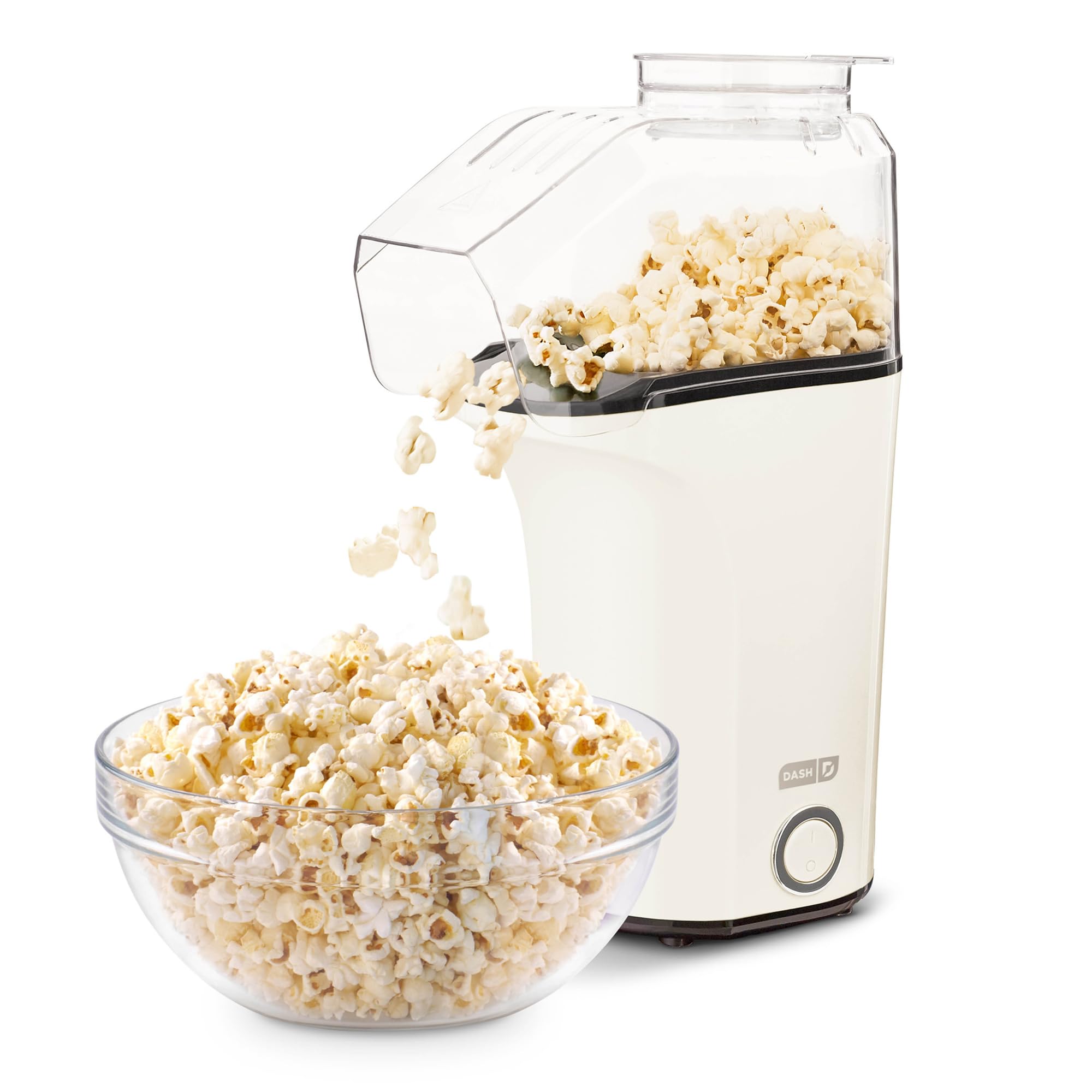 DASH Fresh Pop popcorn maker front view on a clean counter, showing compact design.