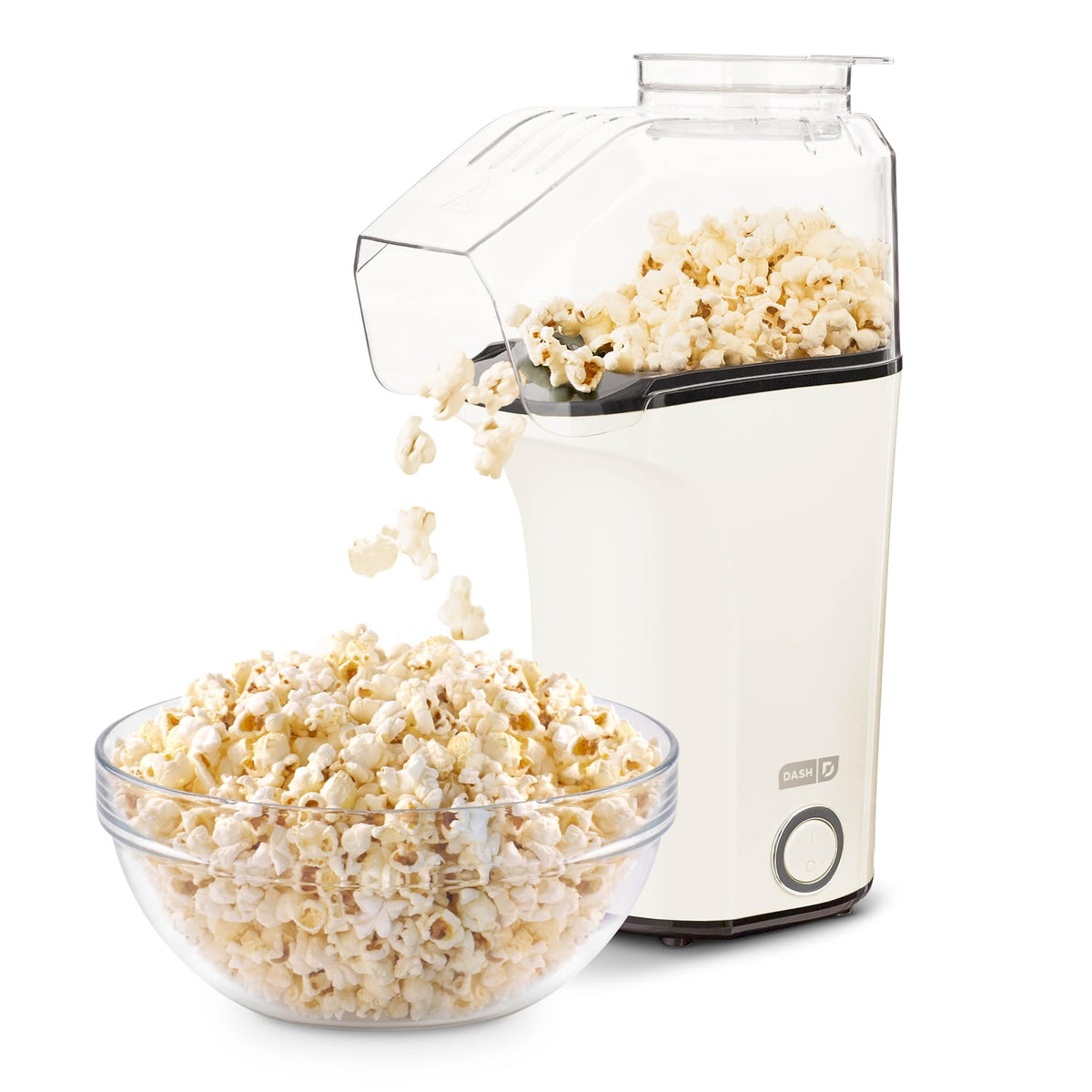 DASH Fresh Pop popcorn maker front view on a clean counter, showing compact design.