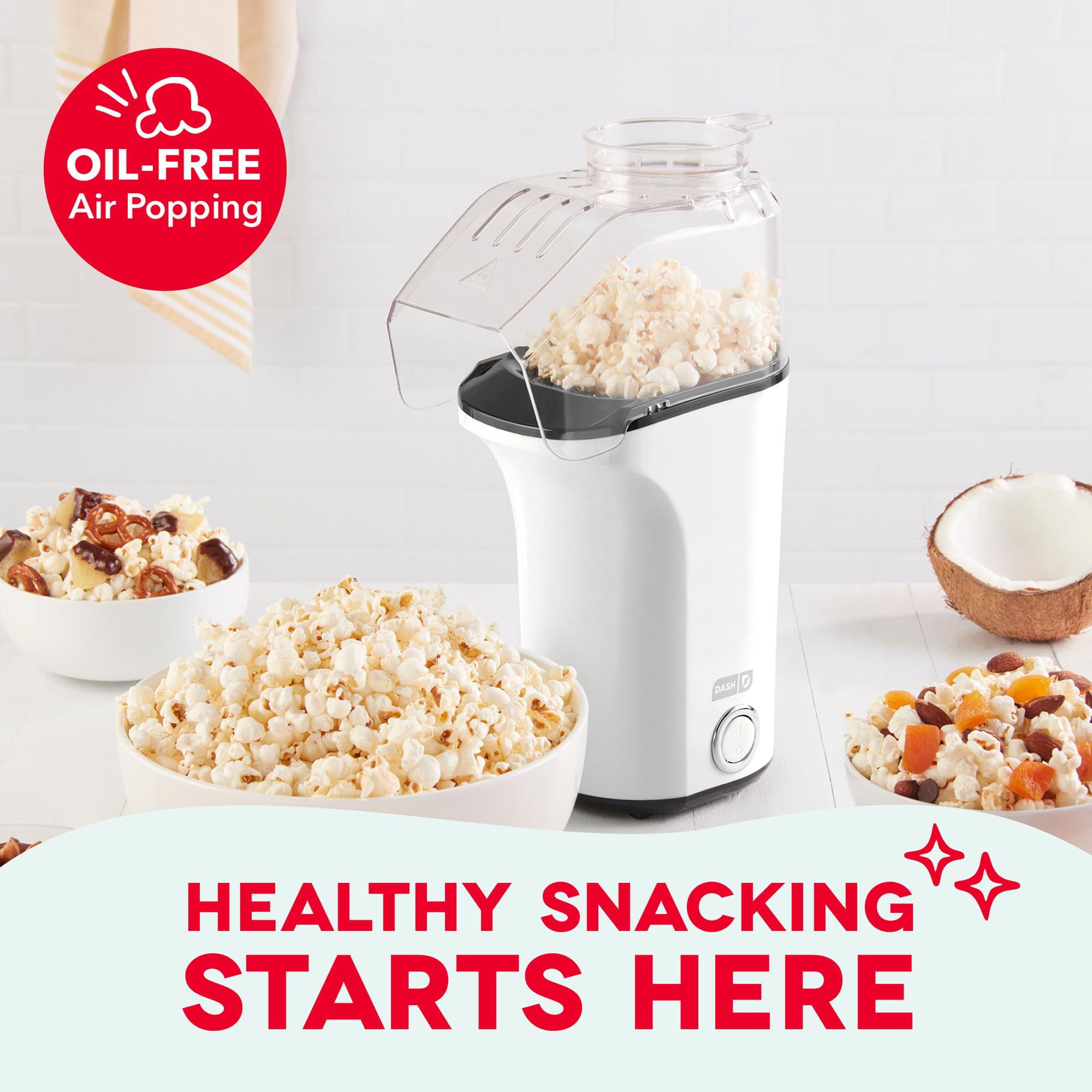 DASH Fresh Pop popcorn maker measuring cup inside for precise kernel portions.