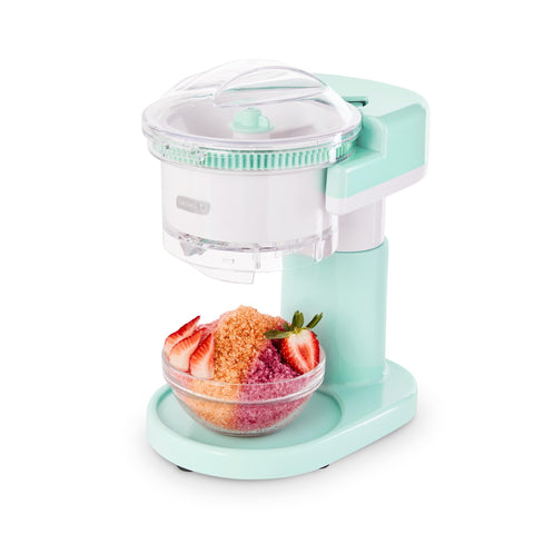Dash Shaved Ice Maker on a clean countertop showcasing space-saving design for easy home use.