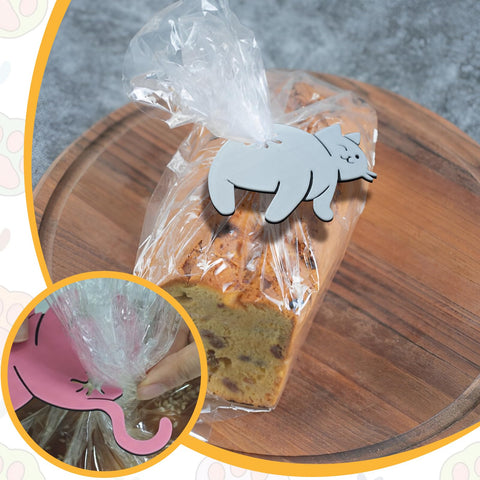 DAUCHVNY blue cat butt clip preserves pantry freshness with whimsy.