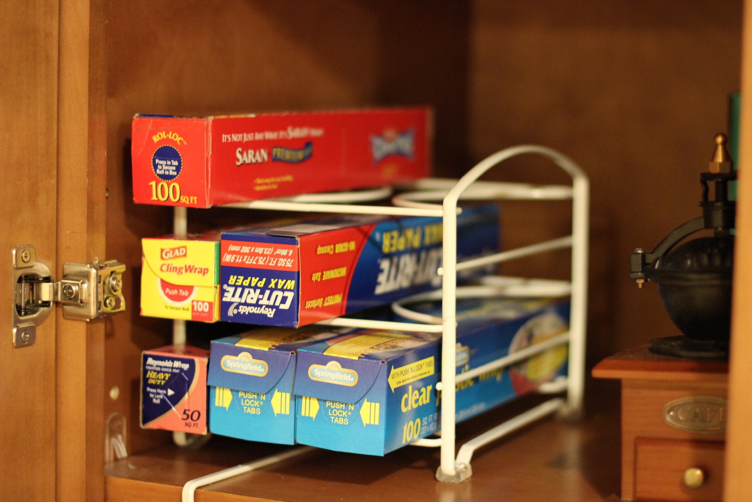 Deco Brothers wrap organizer rack shows three wraps per row for efficient storage.