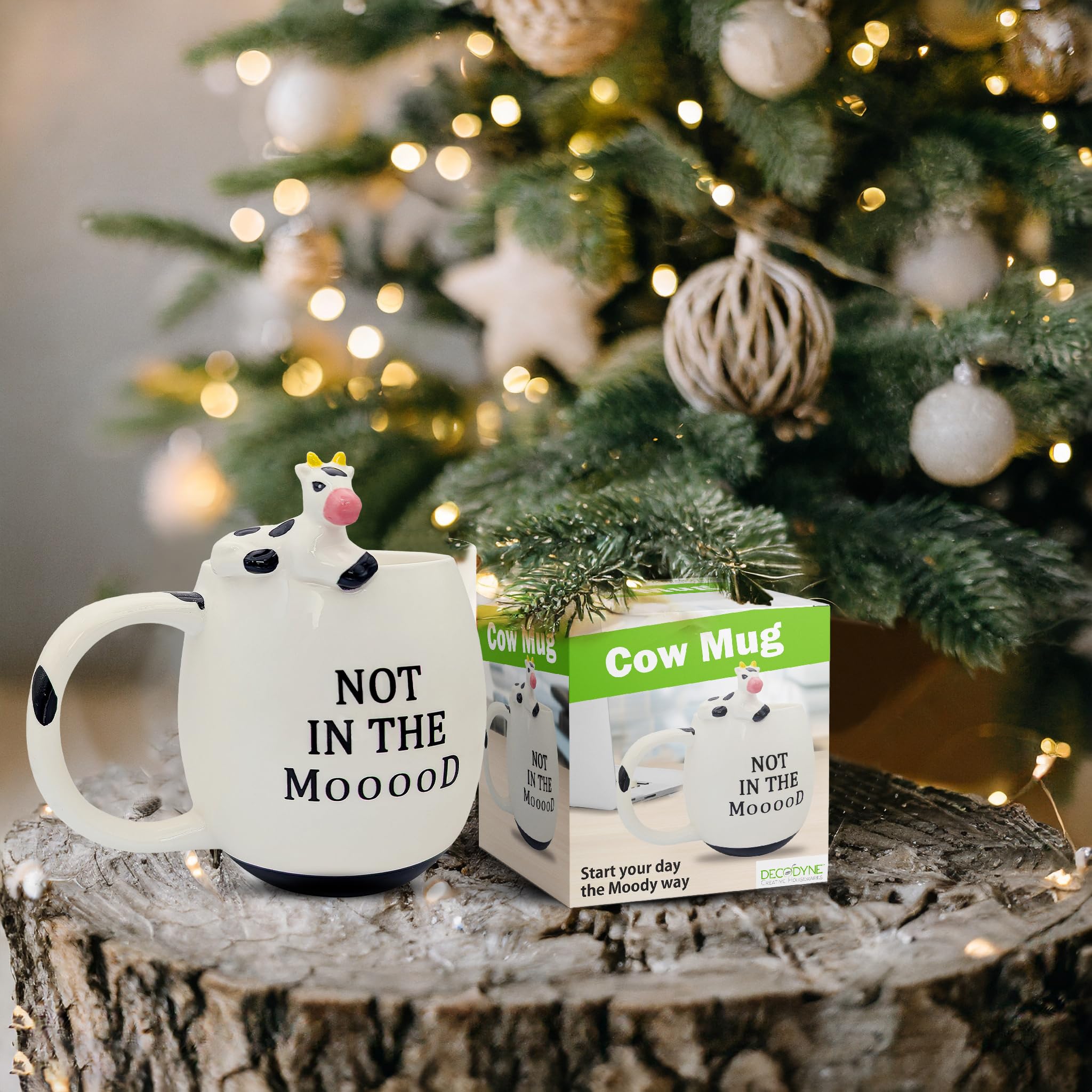 Decodyne cow design mug detail highlighting vibrant glaze for gifting.