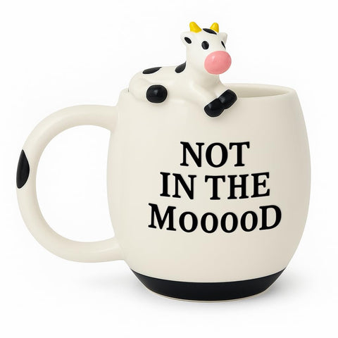 Decodyne funny cow mug front view showing playful design for desk humor.