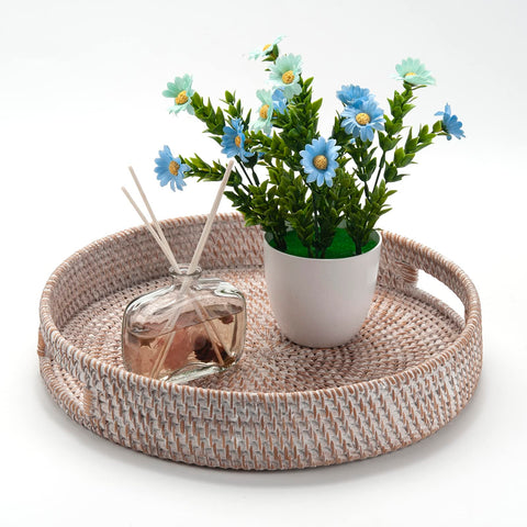 DECRAFTS round rattan tray supports tea service and decor.