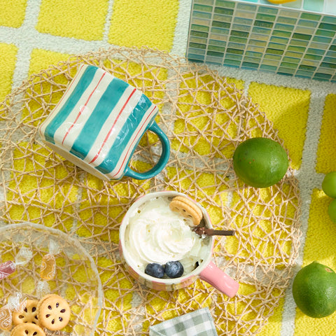 DELIGHTS GALORE striped mugs with comfortable handles for secure, cool-to-touch use.