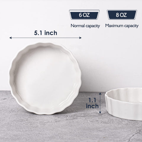 Delling 8-oz round fluted ramekins in white, ideal for individual portions and baking.