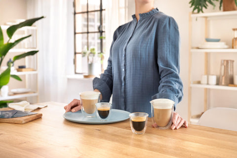 De'Longhi borosilicate thermal espresso glasses, set of two, ideal for hot or cold drinks with stylish grip.