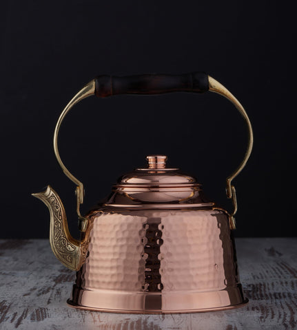 DEMMEX copper teapot spout design enables smooth pouring from stovetop to cup.
