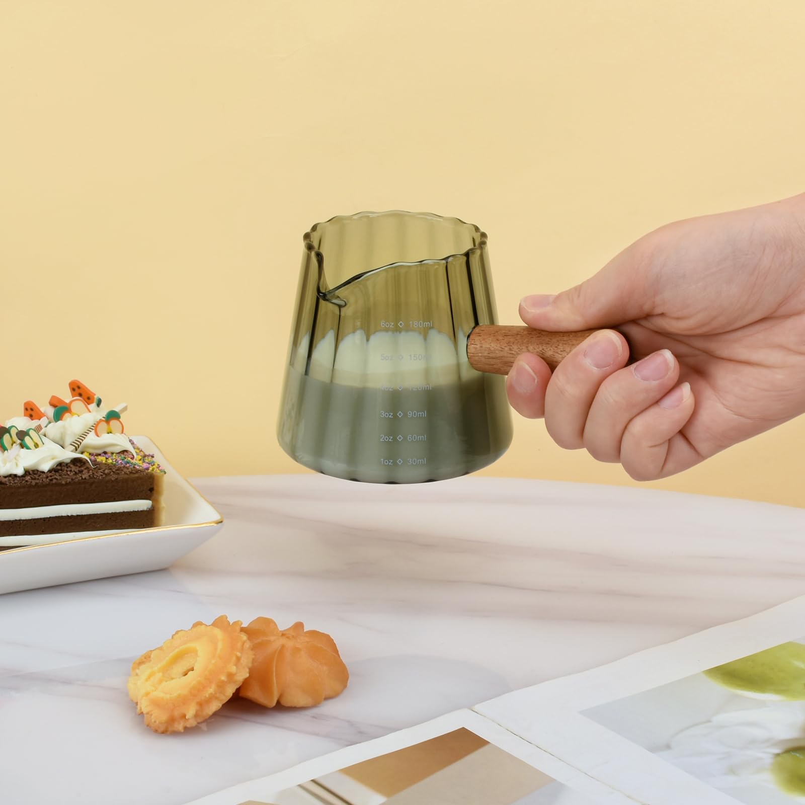 Denovin striped glass body creamer for stylish pour control.