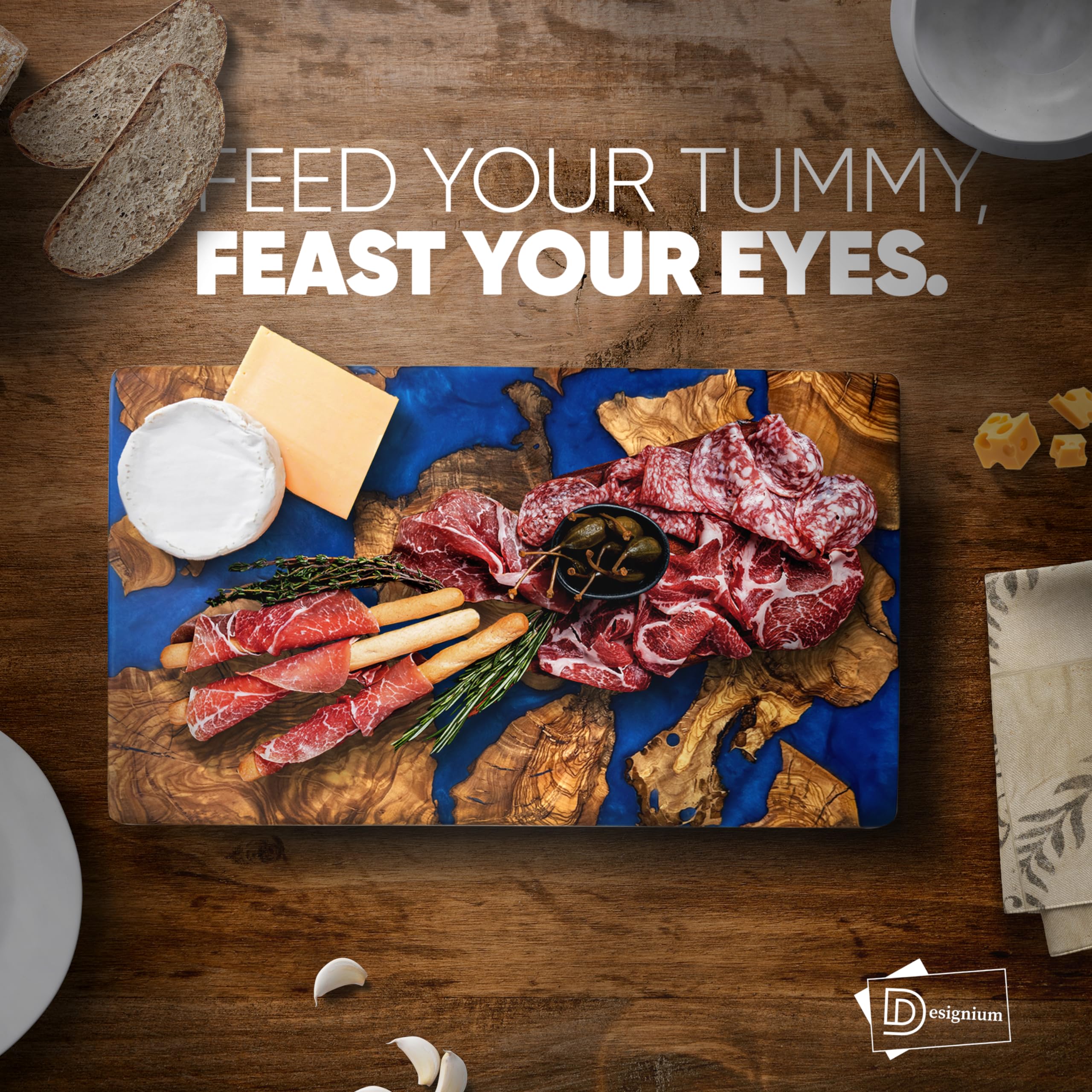 Designium live-edge olive wood board showcased as versatile serving platter.