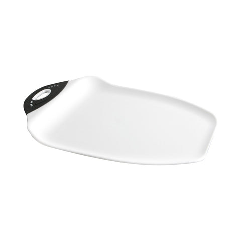 Dexas Chop & Scoop with curved edges guiding chopped produce into a pan