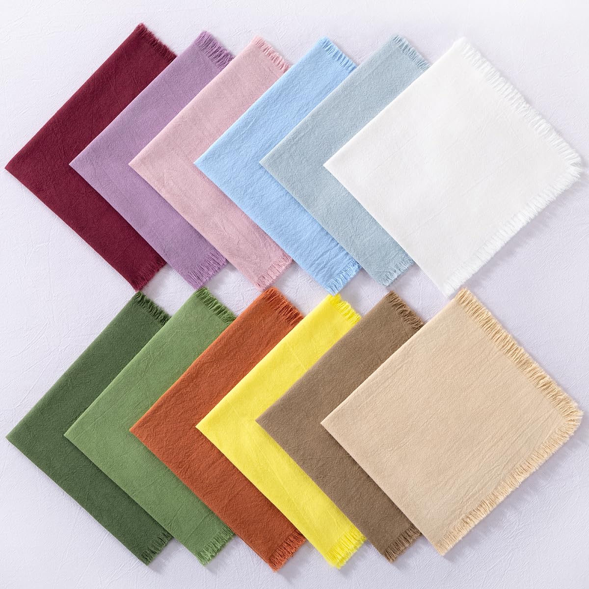 Handmade fringe details on DeZerlor napkins add rustic charm