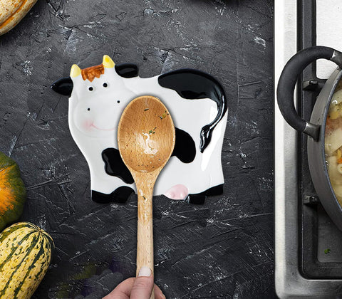 dgudgu Cow Spoon Rest on counter keeps utensils organized and within reach.
