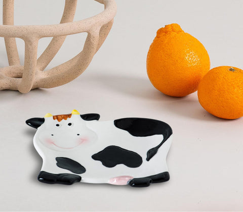 dgudgu Cow Spoon Rest on stove showcases compact, practical design during busy meals.