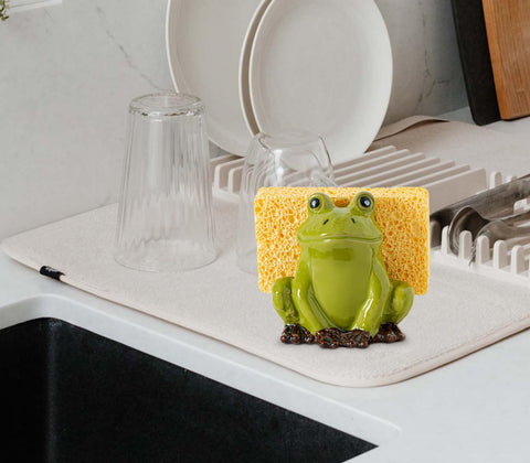 dgudgu frog sponge holder doubles as a decorative kitchen accent.