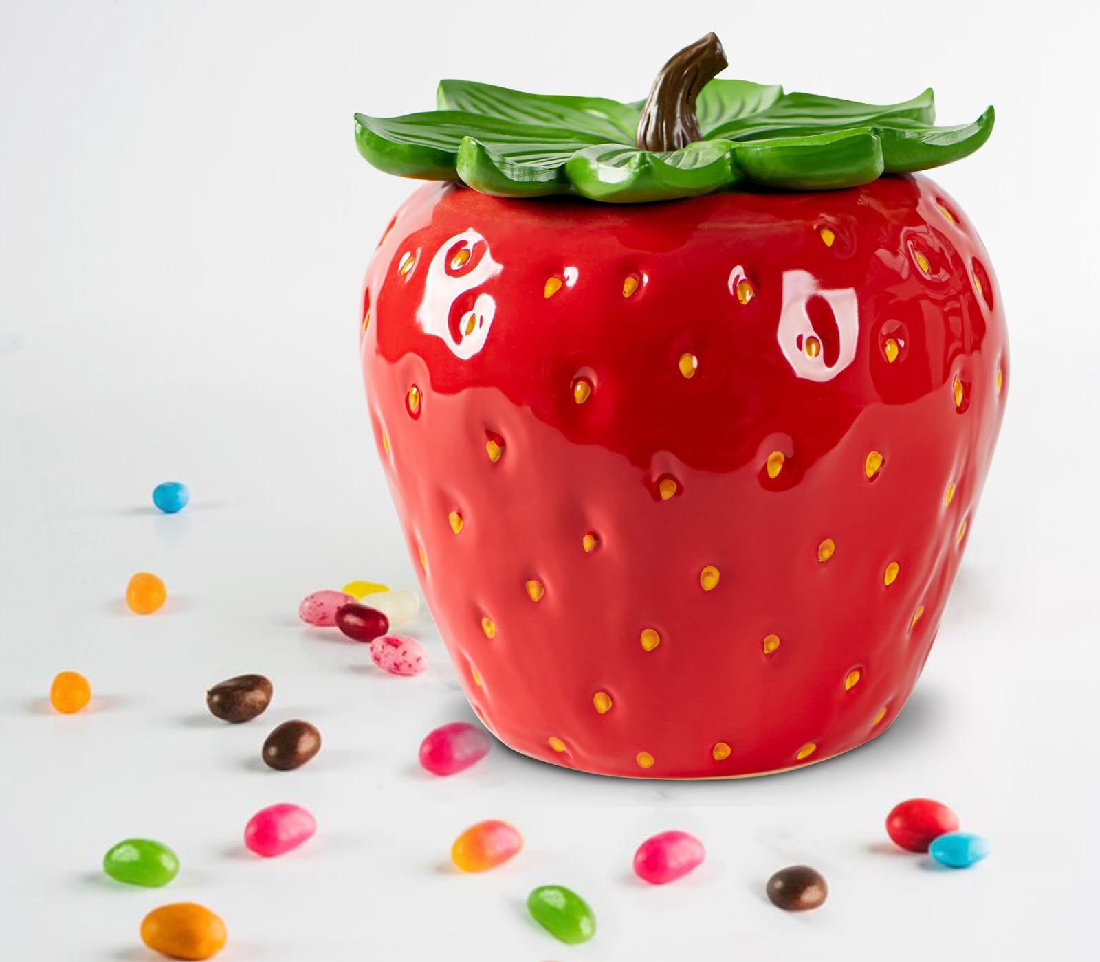 dgudgu strawberry candy jar with lid on desk keeps treats fresh and accessible.