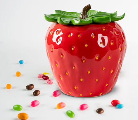 dgudgu strawberry candy jar with lid on desk keeps treats fresh and accessible.