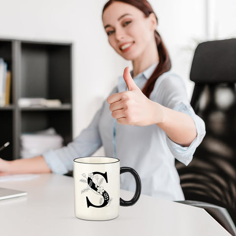 DHQH initial S mug with sturdy handle for comfortable grip.