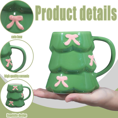 Green ceramic Didaey mug showcases festive charm with delicate pink bow.