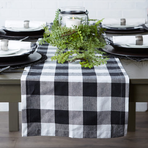 Dining table setting featuring the buffalo check runner