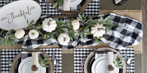 Runner paired with dinnerware and glassware on table