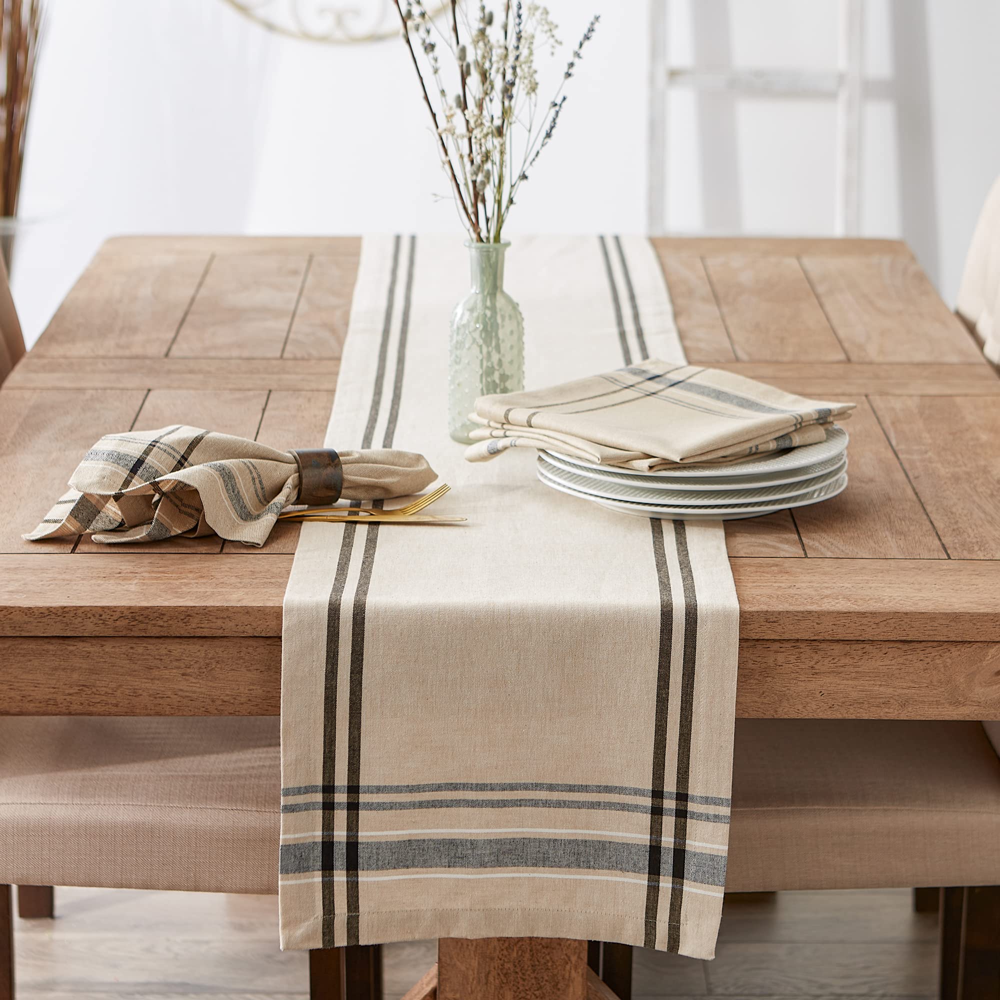 DII French Stripe paired with glassware on elegant table