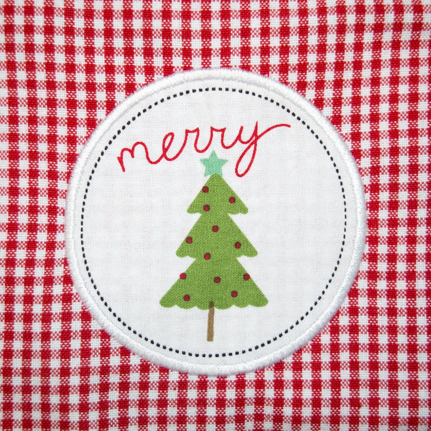 DII women's Christmas apron large center pocket keeps utensils and recipes handy.