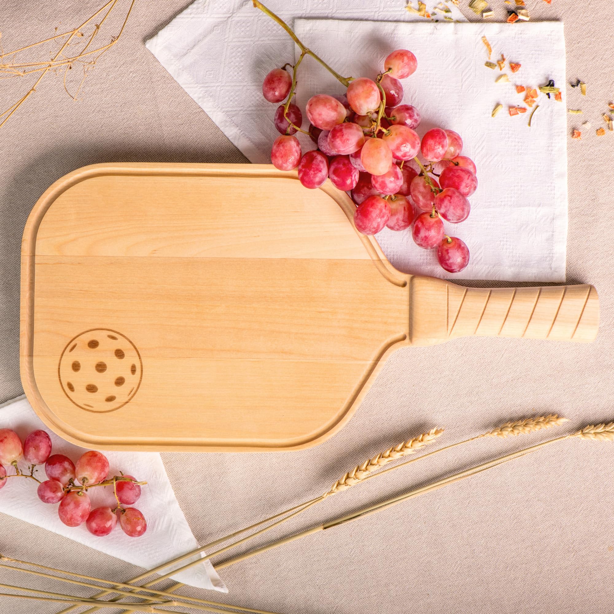 DinkCraft pickleball charcuterie board ready for serving cheese and fruit