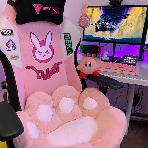 Ditucu Cat Paw Cushion on gaming chair for extended play comfort.